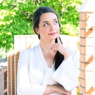 Polina Asmalovskaya from Woodburn & Co Solicitors